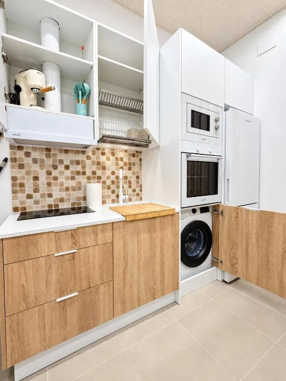 Cocina equipada con lavadora del Estudio Don Pedro II Bajo